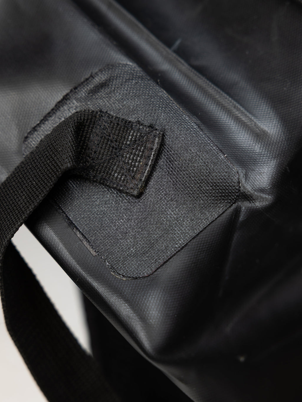 Bag Panel Re-Attachment Repair